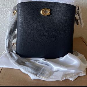 Coach crossover bag.